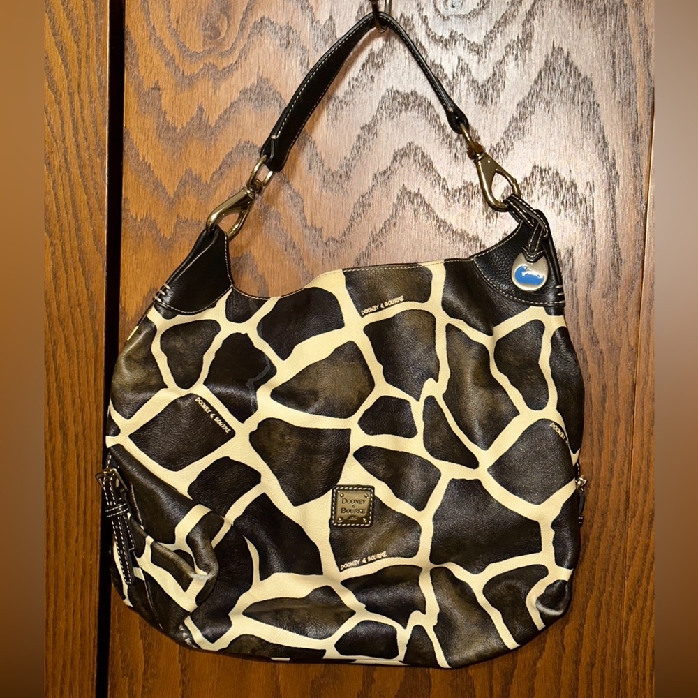 DOONEY & BOURKE. Giraffe print handbag , with Dust cover bag.